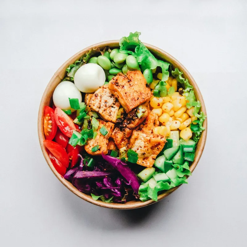 Deep-fried chicken parmigiana with melted mozzarella and fresh basil, Toronto 2026