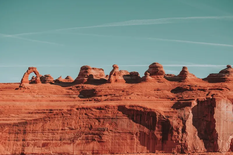 brown rock formation under blue sky during daytime