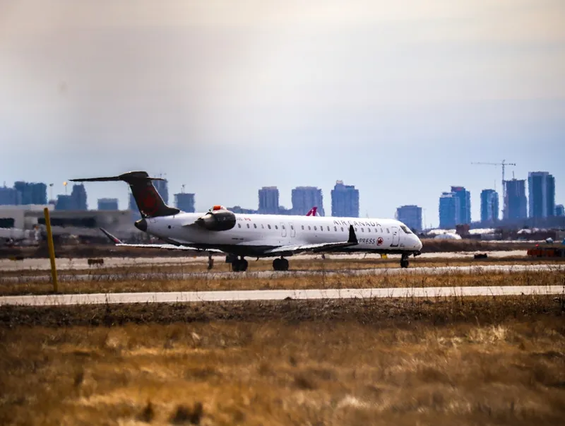 a large white airplane on a run way