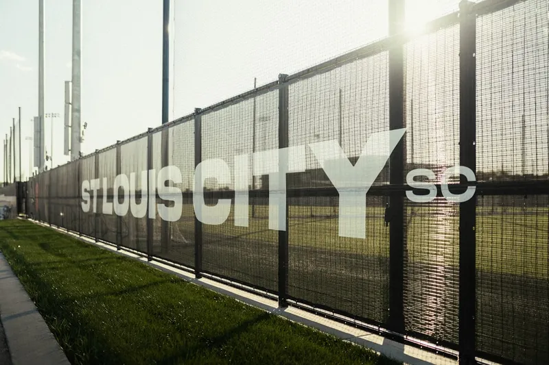 St. louis city sc logo on a fence