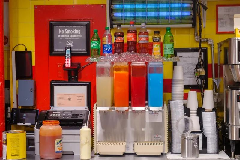 Fountain soda machine with colorful drinks